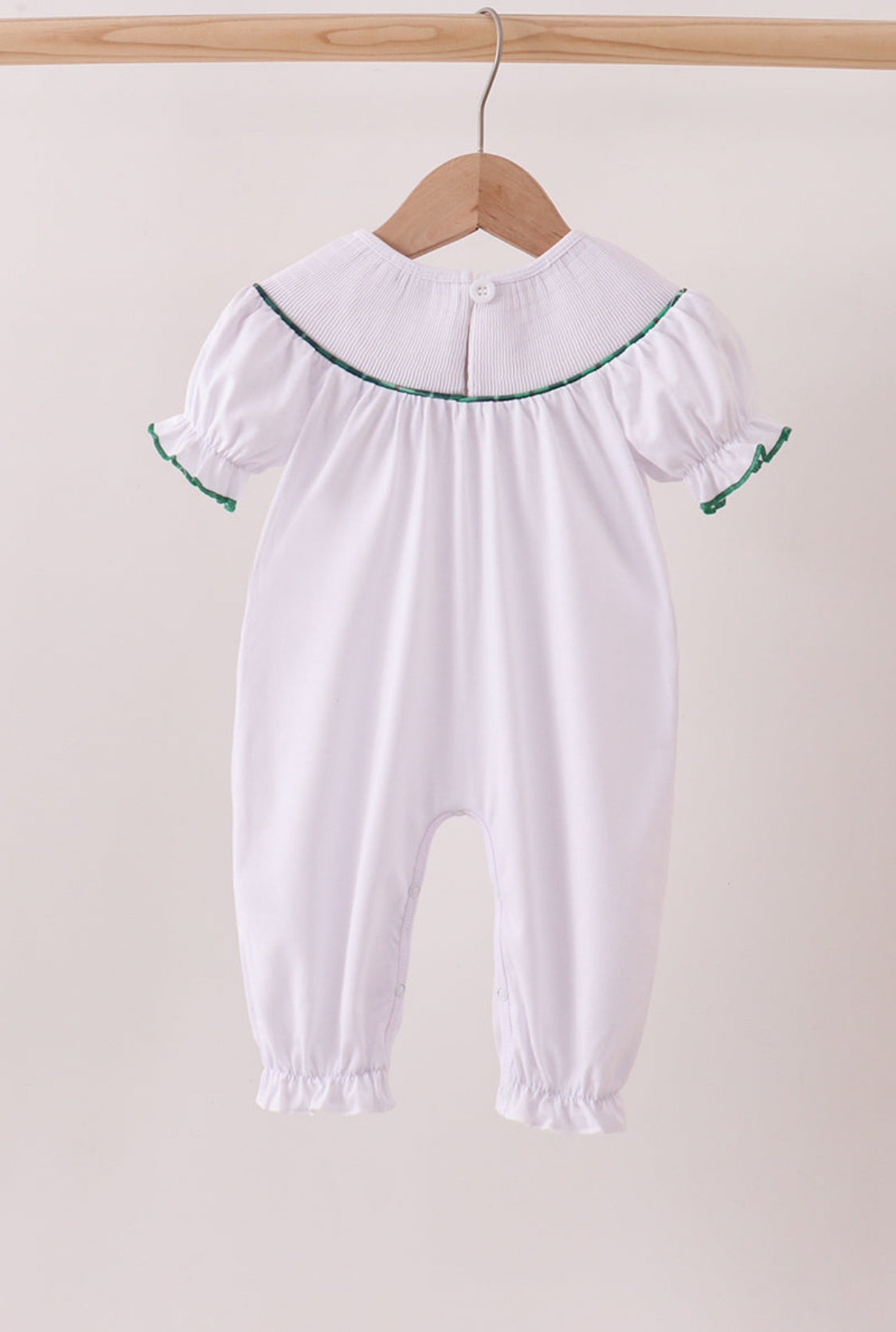 White Wreath Smocked Girl’s Romper.