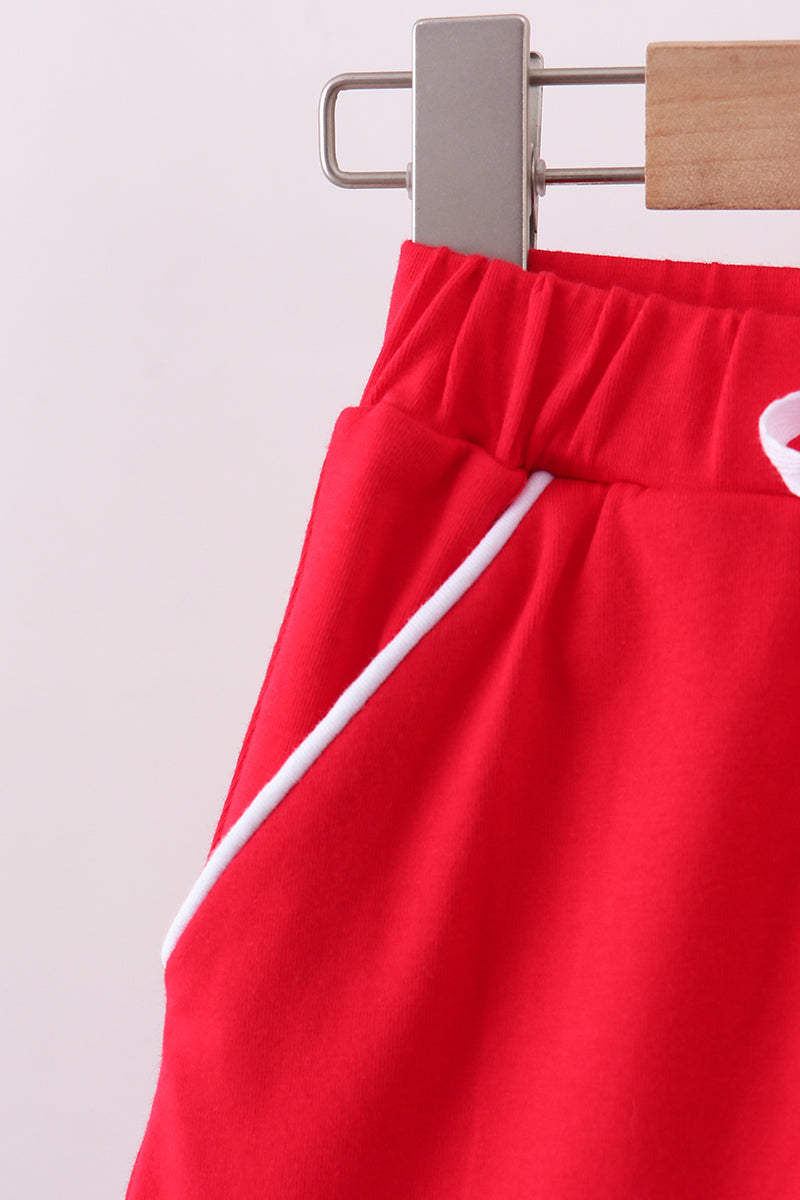 Red scallop hem bow skort