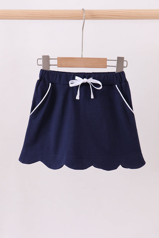 Navy scallop hem bow skort